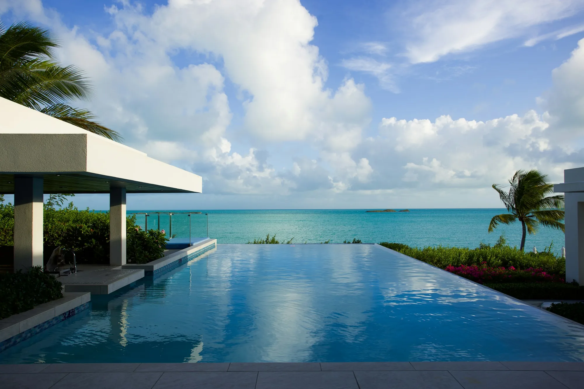 An infinity pool at the edge of the ocean