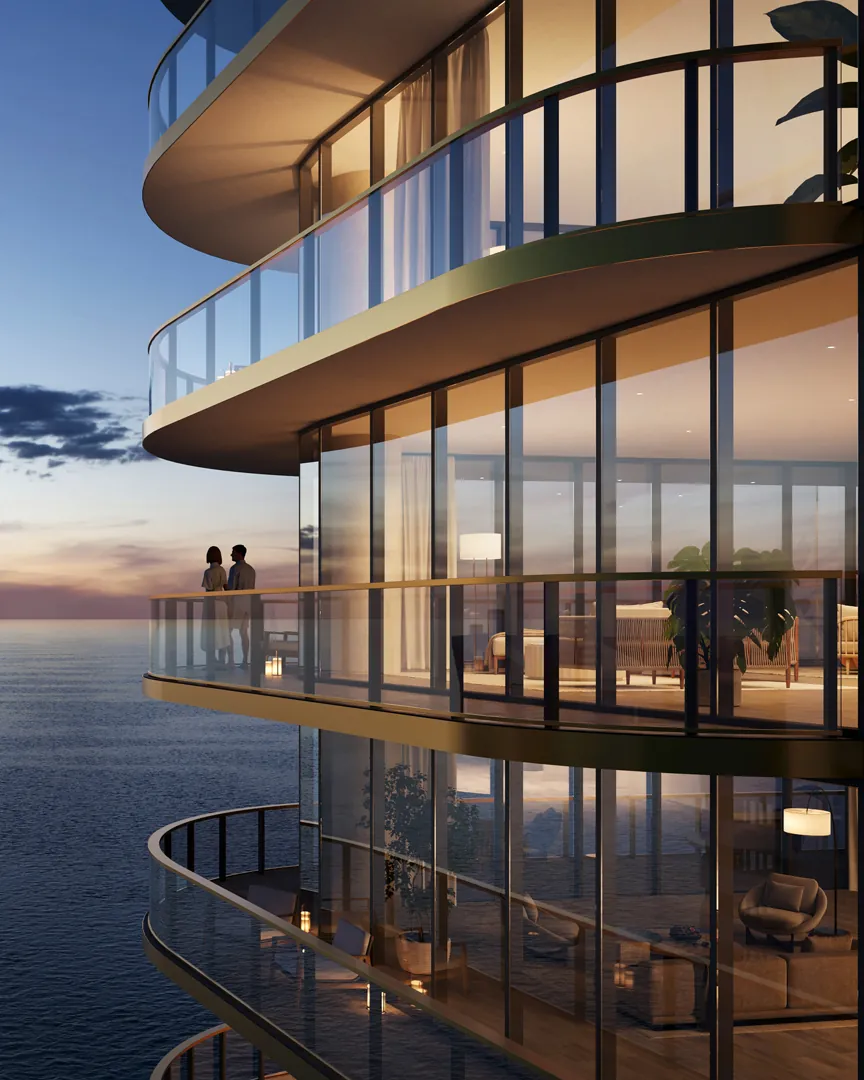 Glass-walled residences over the water at dusk
